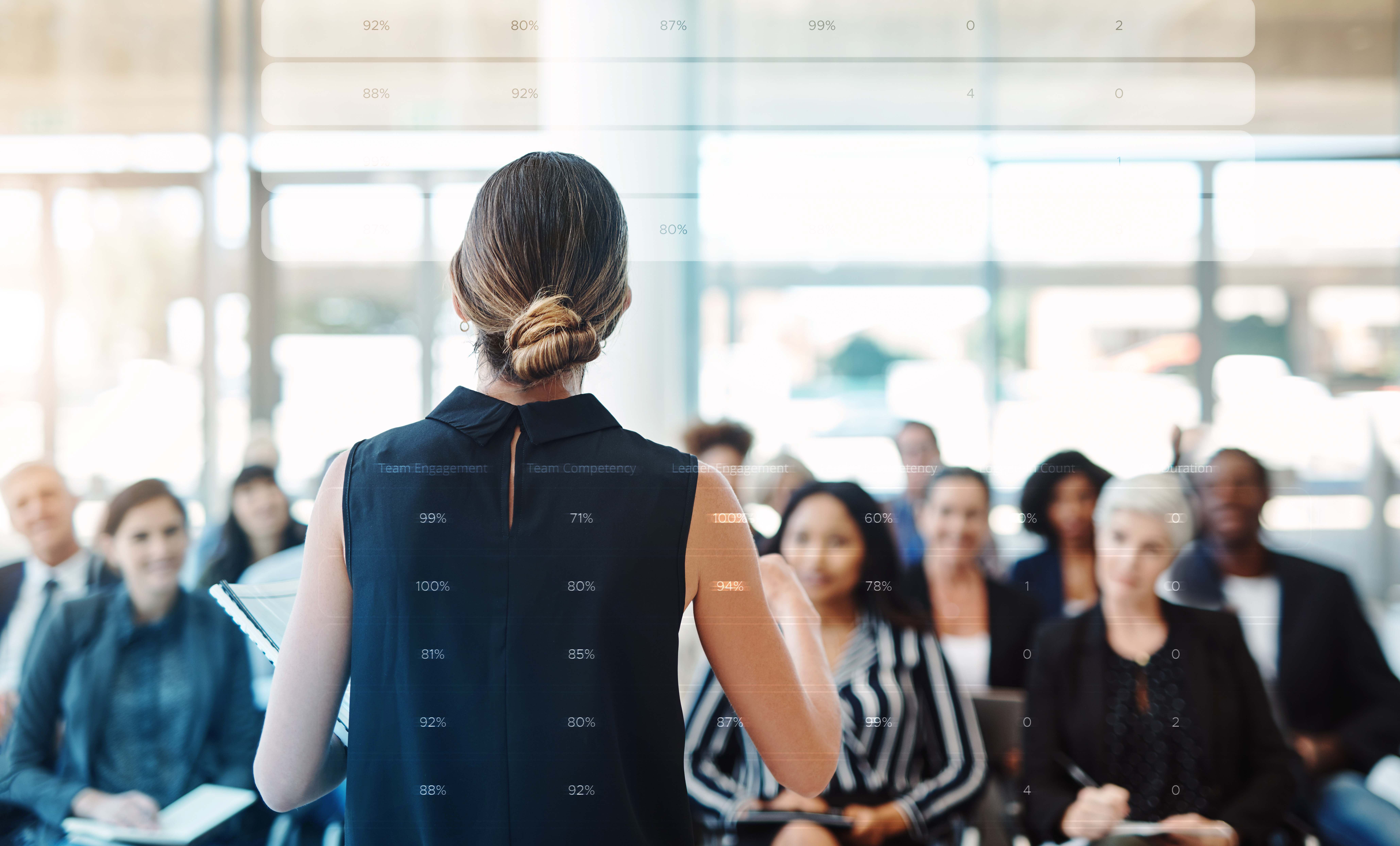 Shot of a young businesswoman delivering a speech during a conference